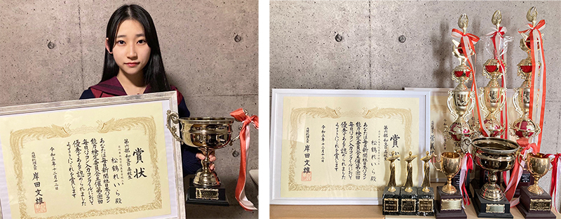 日本一の賞状とトロフィーを手に微笑む松鶴さん